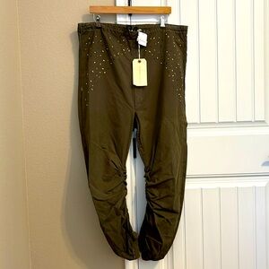 Free People pants. Size M/L. Olive green with embellishments
